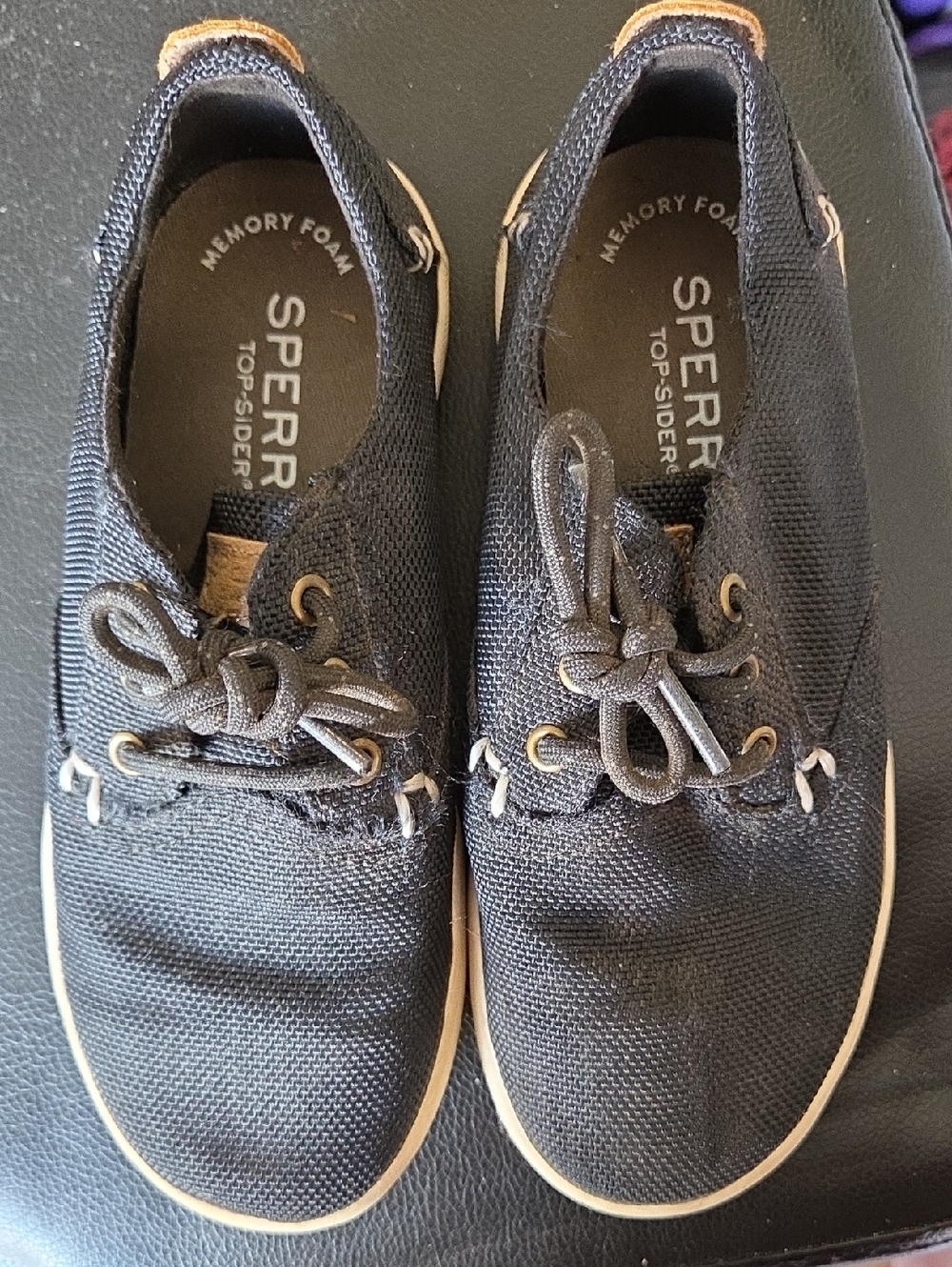 Sperry Boy's Black Canvas Memory Foam Boat Shoes with Tan Trim.